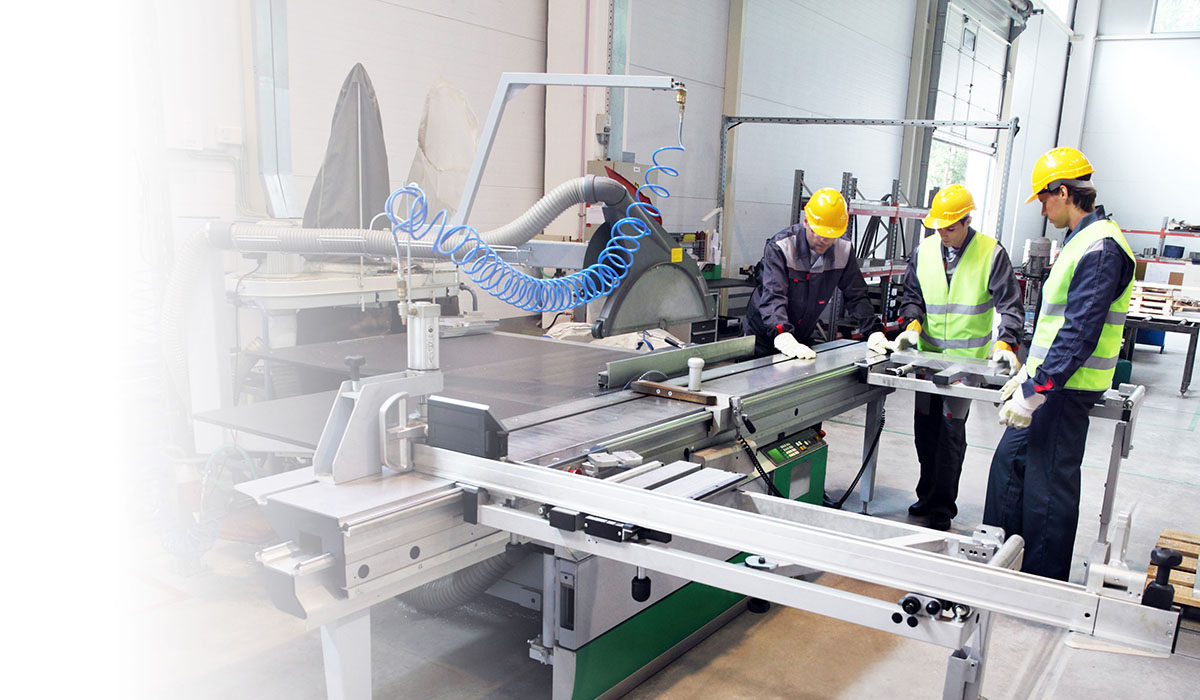 Factory workers collaborating